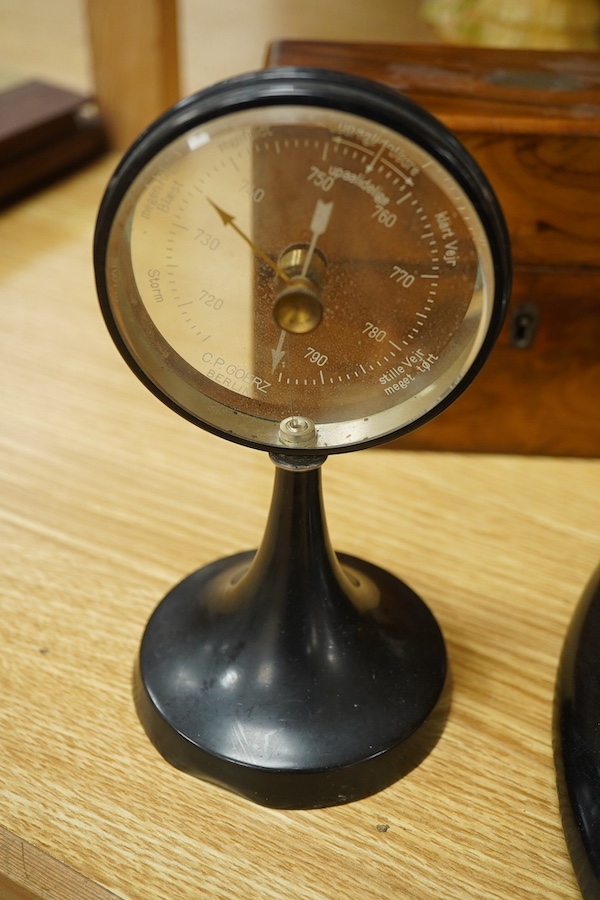 A yew wood domed box, an olivewood scent bottle box, a horn oval box and black circular mirror and two instruments, mirror 30cm diameter. Condition - fair to good